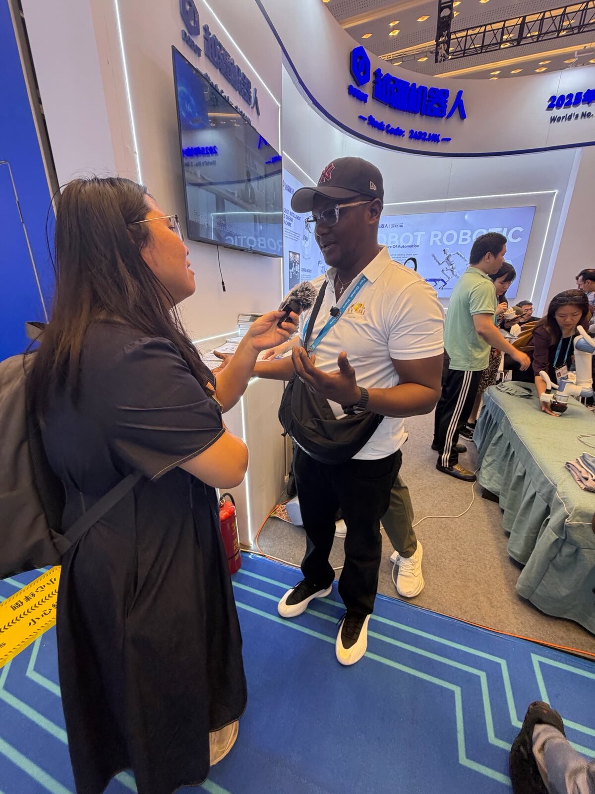 Interview at the robotics booth — automation section