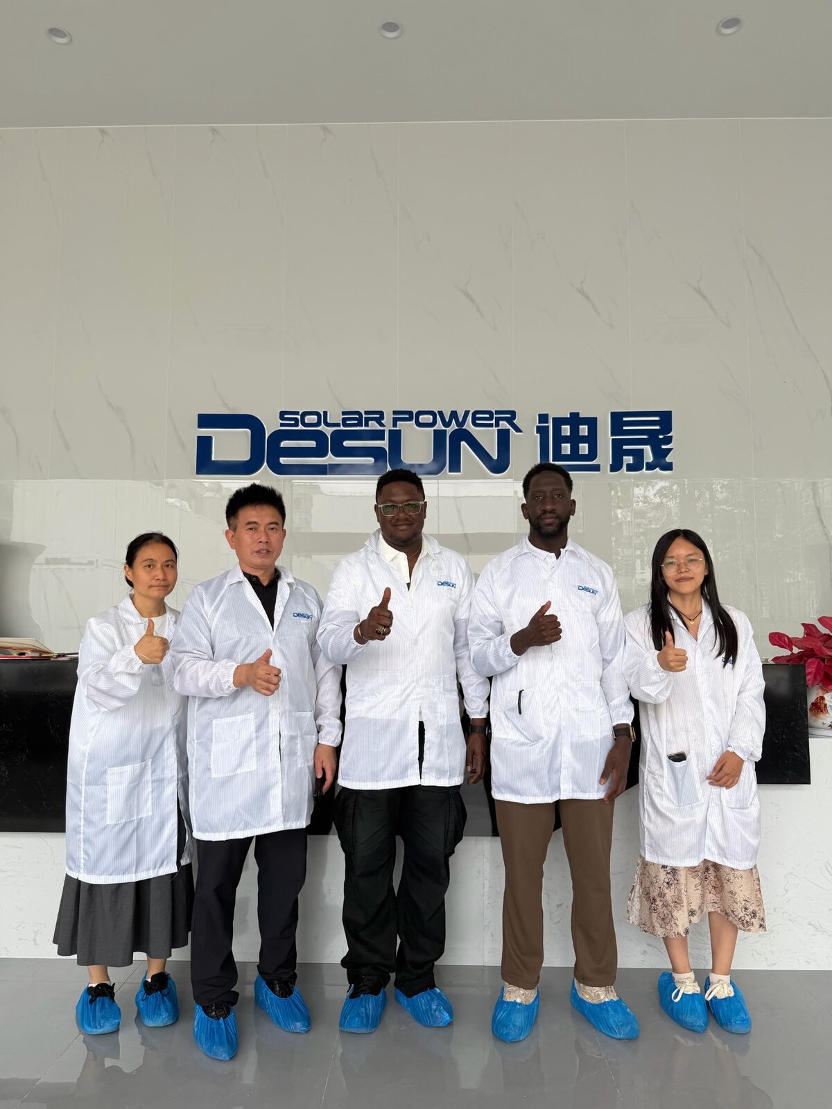 Production line tour, cleanroom suits